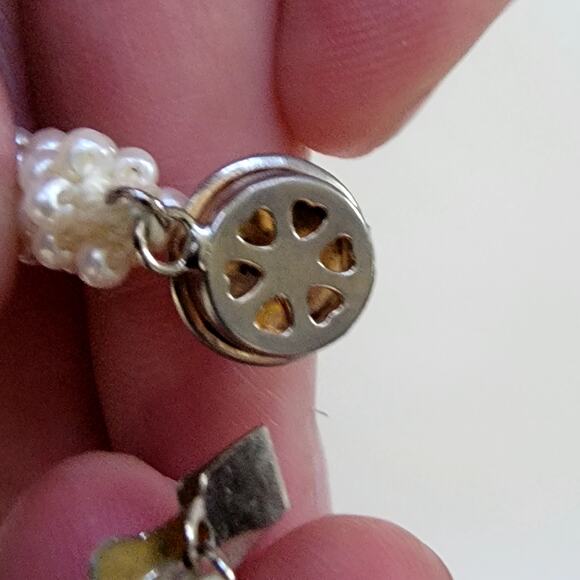 Ivory Twisted Faux Pearl Beaded Necklace Elegant Design & Classic Clasp Closure - Picture 9 of 10